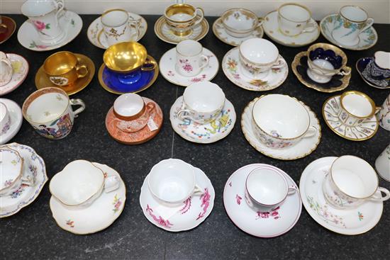 A collection of twenty eight Continental porcelain tea and coffee cups and saucers and four other cups, late 18th - early 20th century,